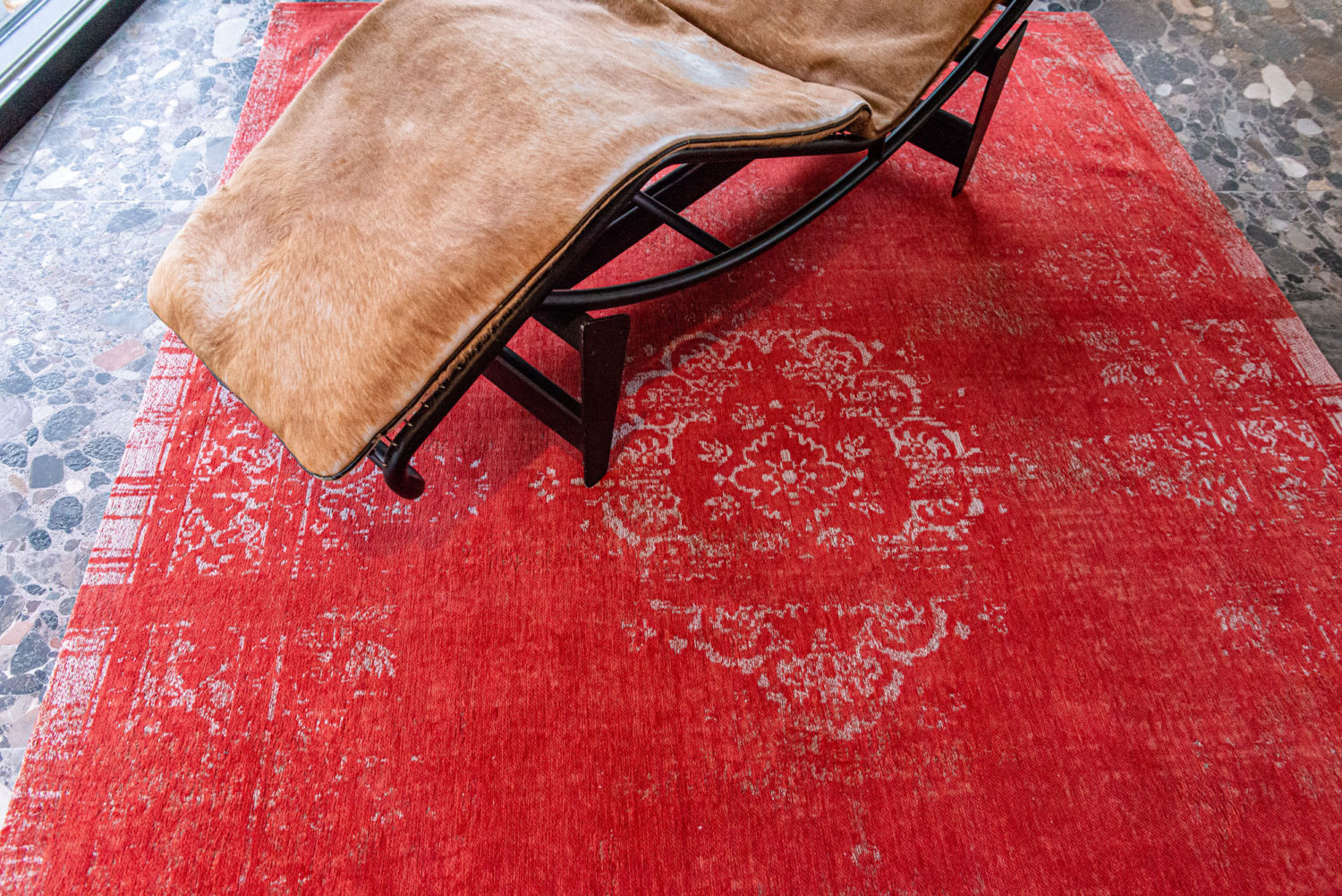 The central pattern or medallion of this rug is an ancient classic.