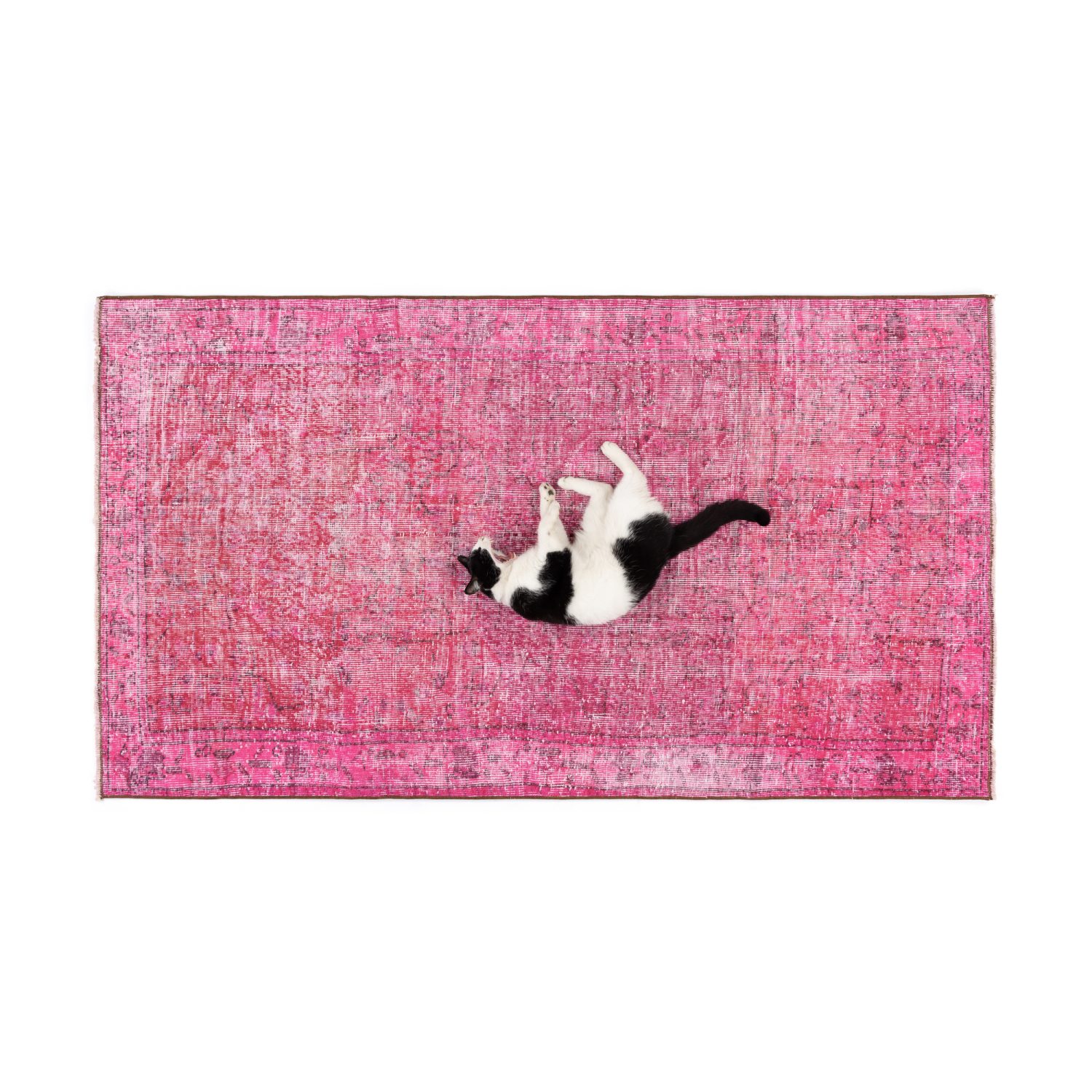 Pink vintage wool rug from our up-cycled and reworked vintage collection.