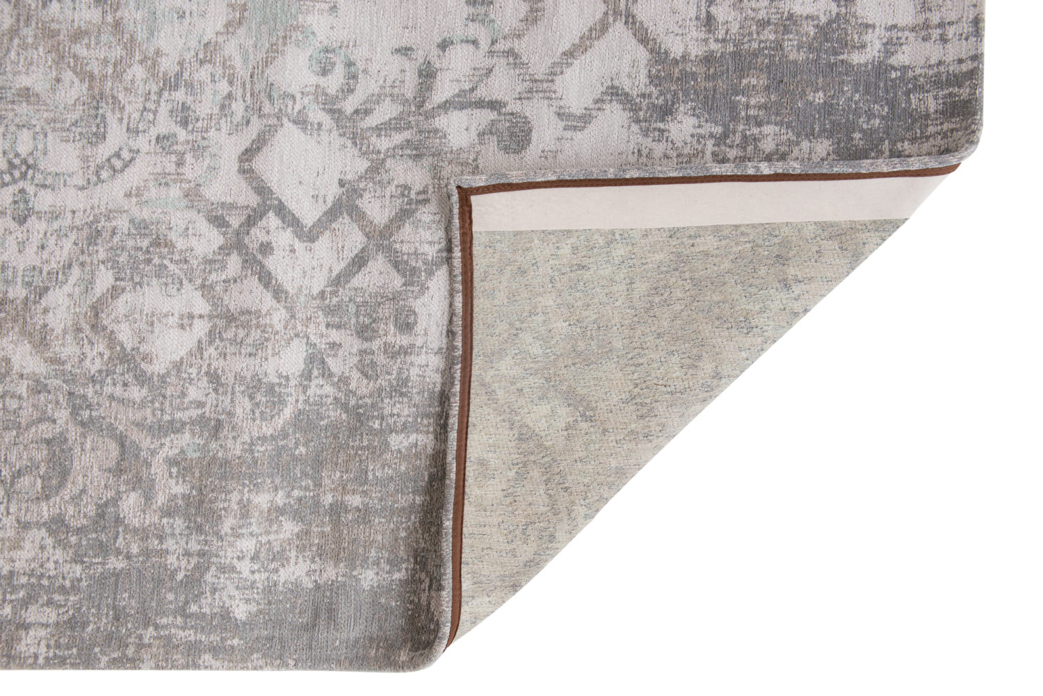 Multi-layered composition of floral, Arabic geometric and distressed elements, set in soft hues