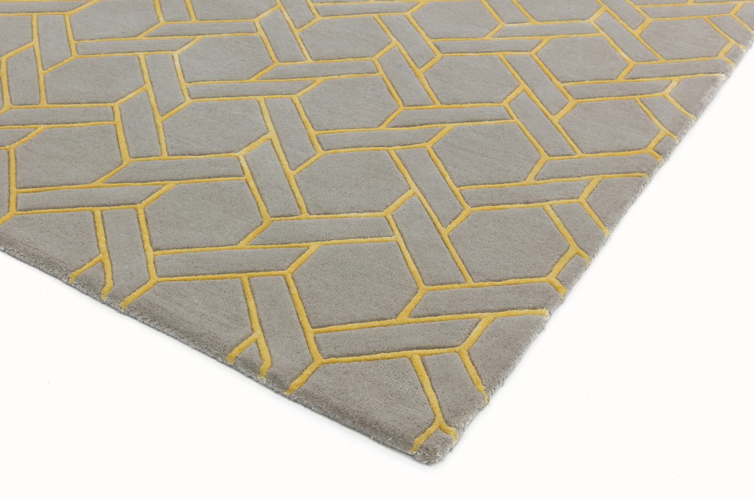 Prenium quality tufted rugs in precise hand carved geometric designs