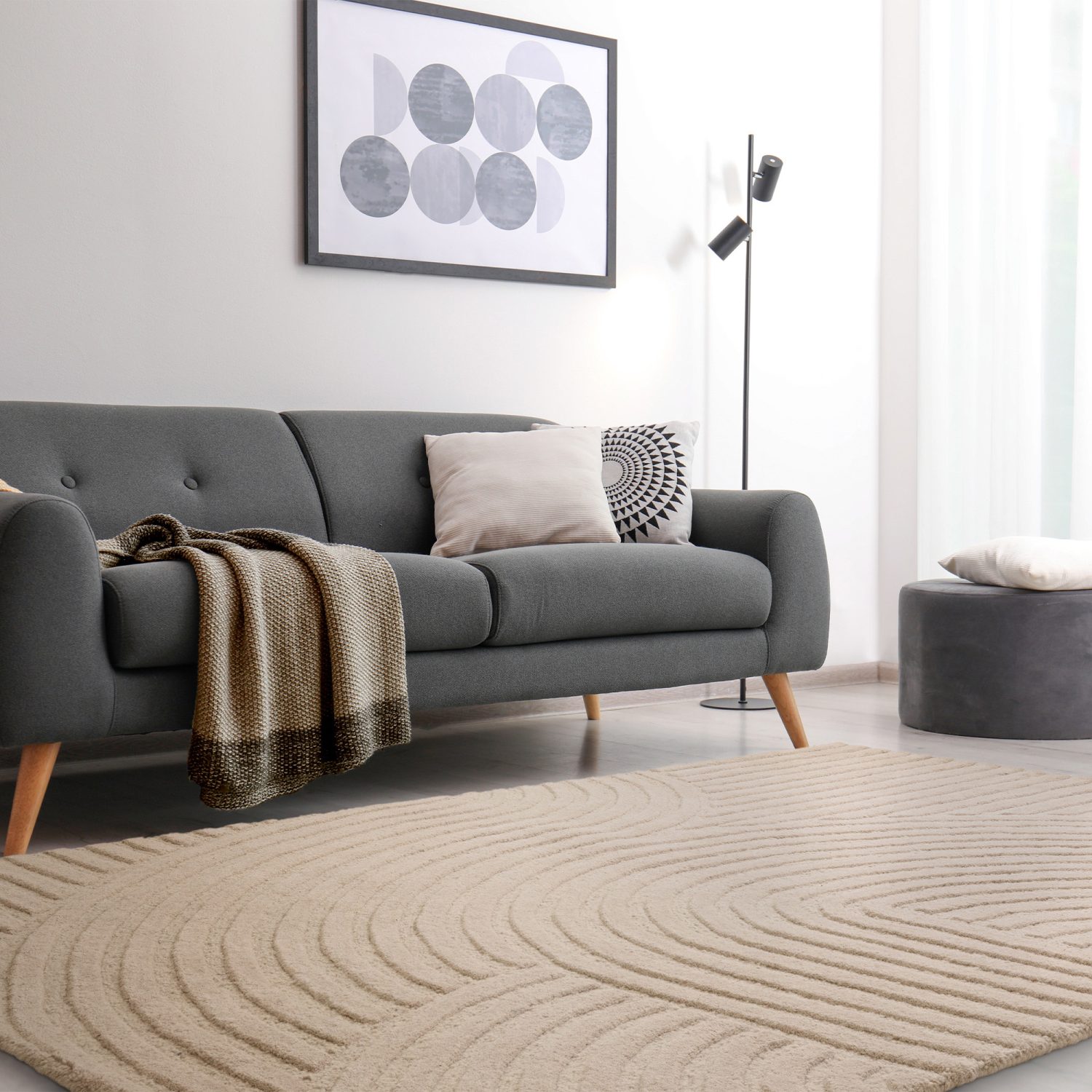 The textural and multi pile height Morf rug in a stripped back modern space.
