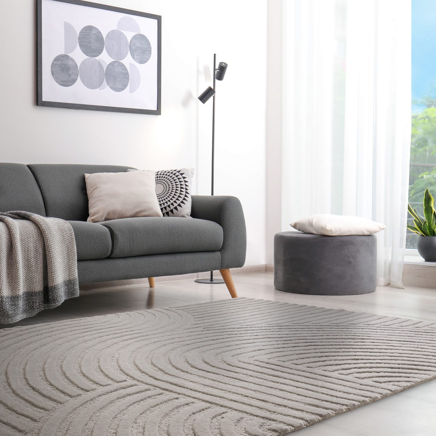 Transform your living space with our stunning silver coloured geometric rug.