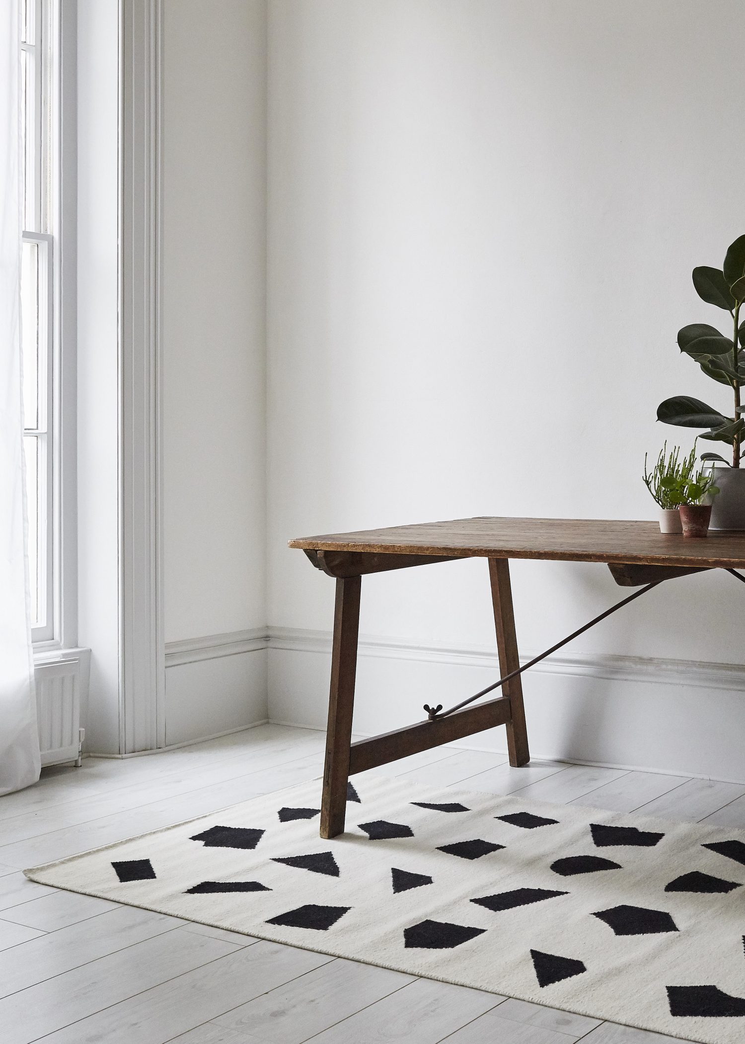 Unusual shapes and high-contrast define this modern kilim