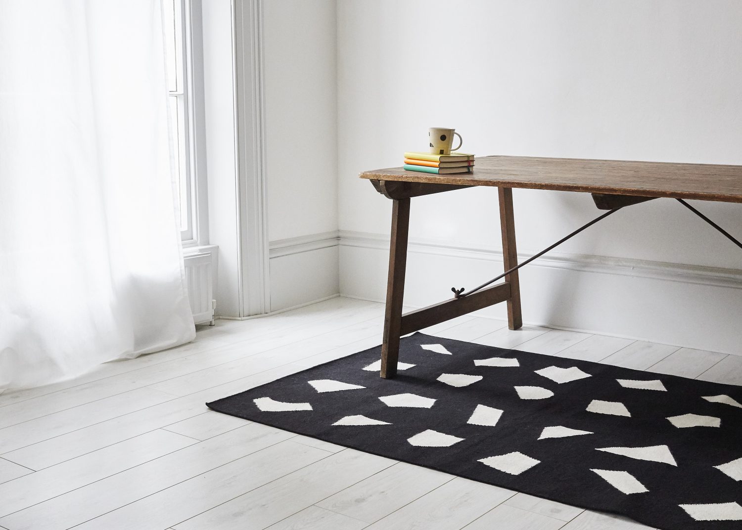 Unusual shapes and high-contrast define this modern kilim