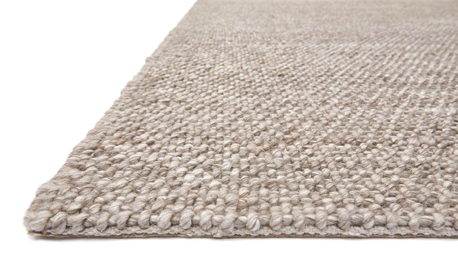 Bring the beauty of the coast into your home with this beautiful camel coloured rug